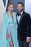 Chrissy Teigen och John Legend på Oscarsgalans efterfest.
