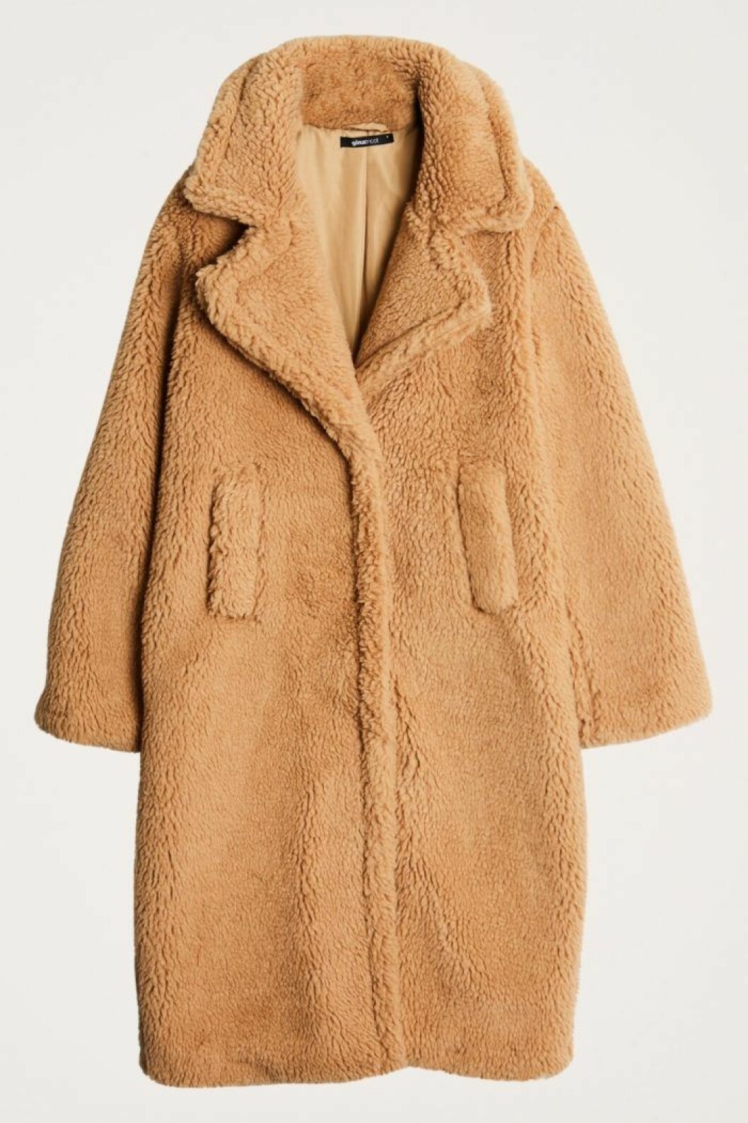 Beige fuskpäls för dam