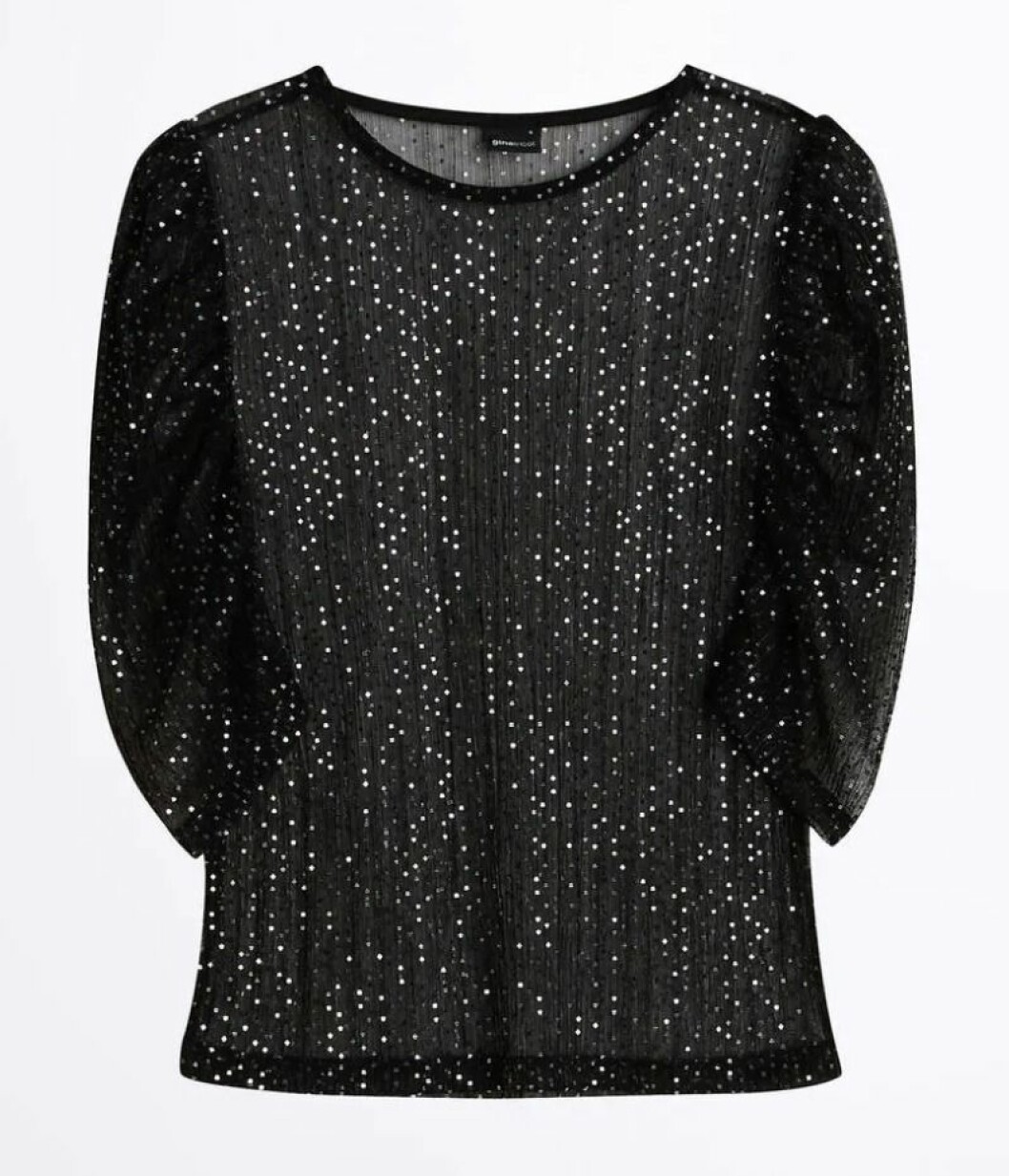 Glittrig topp med puffärm