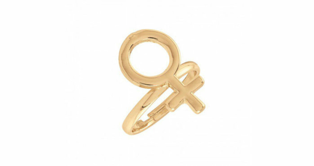 Guldig ring med kvinnosymbol