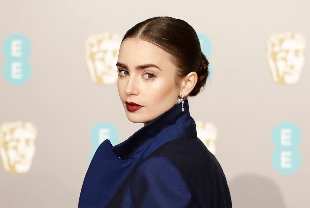 Lily Collins som Bella Swan