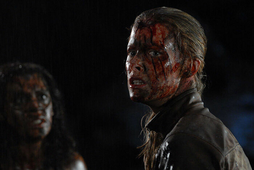 Någonting gömmer sig i mörkret i skräckfilmen <em>The Descent</em>. En bild från skräckfilmen The Descent.